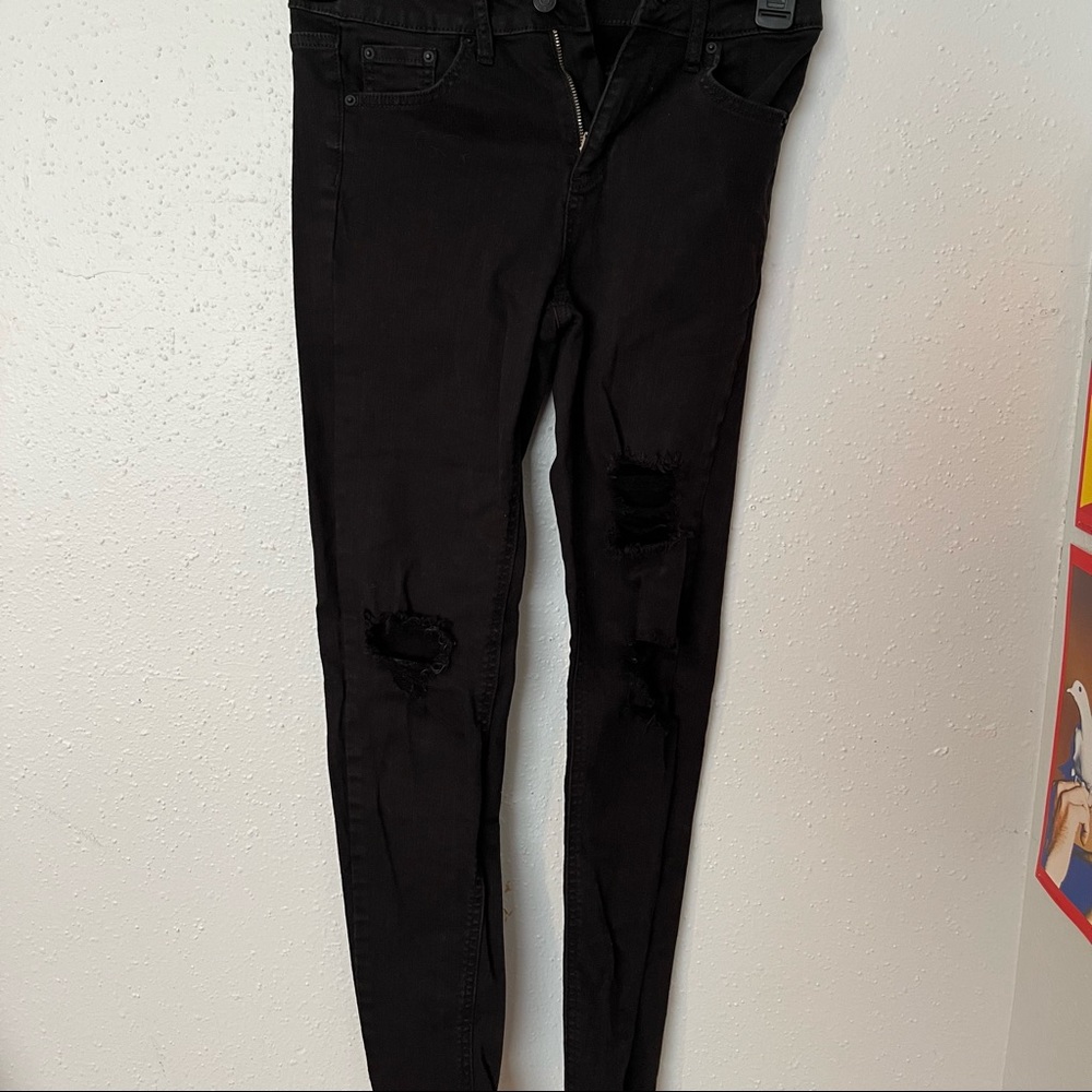Black distressed jeans